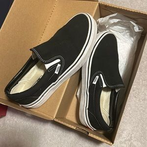 Classic white and black Slip on Vans. Size 8 women’s
